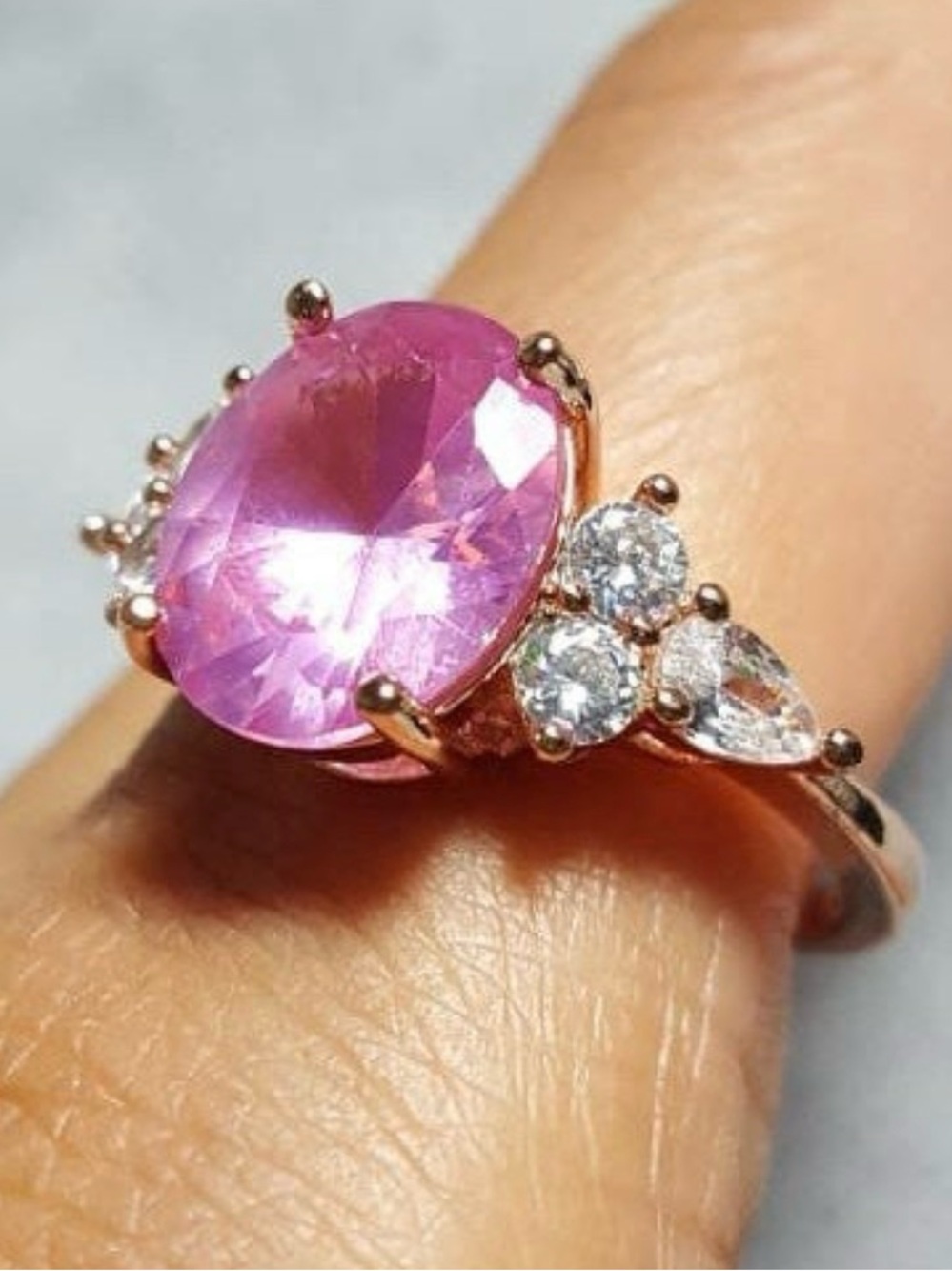 Rose Gold Pink Oval Gemstone Ring with Accent Stones